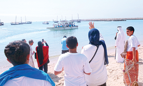 KUWAIT: Friends and family members bid farewell to pearl divers as the annual traditional pearl diving event kicks off yesterday morning. — Photos by Yasser Al-Zayyat