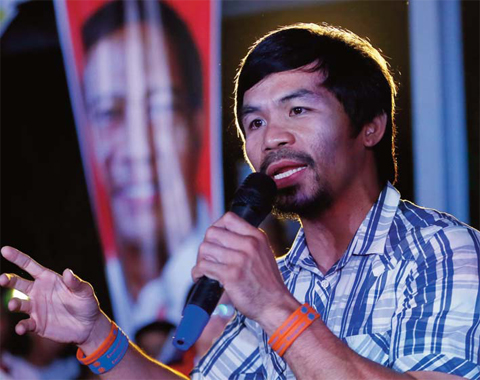 MANILA: In this April 28, 2016, file photo, boxing star Manny Pacquiao addresses supporters as he campaigns for a seat in the Philippine Senate at San Pablo city, Laguna province south of Manila, Philippines. Pacquiao, who said before his last fight in April that he would retire, now plans to return to the ring in November against an opponent who has yet to be selected. — AP