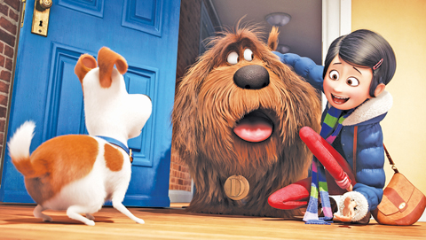 In this image released by Universal Pictures, from left, characters Max, voiced by Louis CK, Duke, voiced by Eric Stonestreet, and Katie, voiced by Ellie Kemper, appear in a scene from, “The Secret Lives of Pets.” — AP