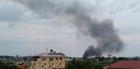 JUBA, SOUTH SUDAN: Black smoke is seen rising above the capital on Sunday. — AP