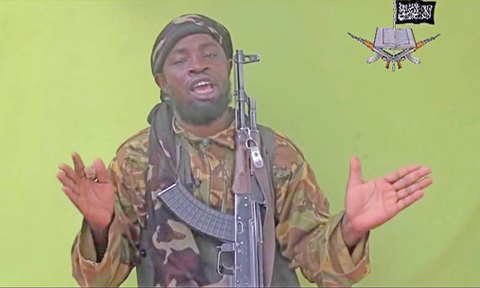 KANO: In this file photo Boko Haram’s leader Abubakar Shekau speaks to the camera. A struggle in Nigeria’s Islamic extremist group Boko Haram is playing out in public with a new leader named by the Islamic State group accusing longtime leader Abubakar Shekau of killing his own people and living in luxury while fighters’ babies starve. — AP