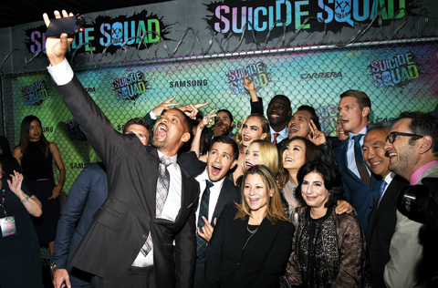 Will Smith takes a selfie with the cast and crew of “Suicide Squad at the film’s world premiere at the Beacon Theatre on Monday, Aug. 1, 2016, in New York.