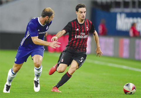 MINNEAPOLIS: Branislav Ivanovic #2 of Chelsea and Giacomo Bonaventura #5 of AC Milan go after the ball during the second half of the International Champions Cup match on August 3, 2016 at US Bank Stadium. — AFP