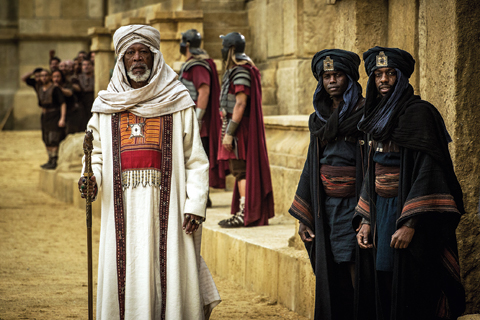 This image released by Paramount Pictures shows Morgan Freeman as Ilderim, left, in a scene from “Ben-Hur.”