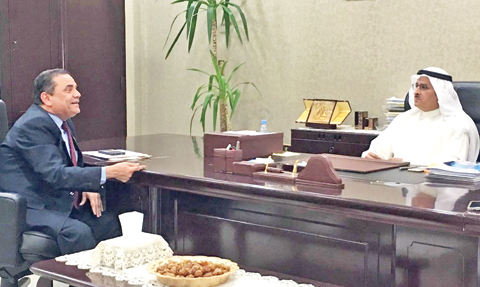 KUWAIT: Abdullah Al-Mutawtah, Acting Director of the Public Authority for Manpower (right), meets with Jamal Sayed Ahmad, Labor Consultant at the Egyptian Embassy in Kuwait. — KUNA