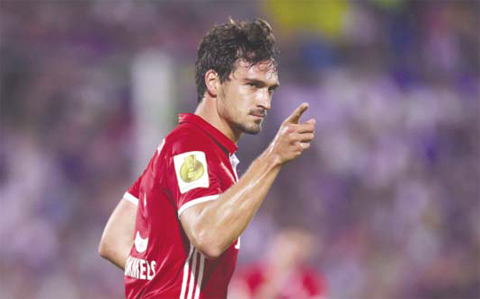 THURINGIA, Germany: Bayern Munich’s defender Mats Hummels reacts after scoring during the German Cup (DFB Pokal) first round football match between the German first division team Bayern Munich and the German regional soccer team Carl Zeiss Jena. — AFP