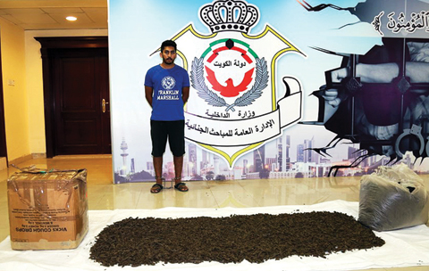 KUWAIT: This photo released by the Interior Ministry yesterday shows a man arrested for attempting to smuggle marijuana into Kuwait inside a parcel imported from India via the UAE.