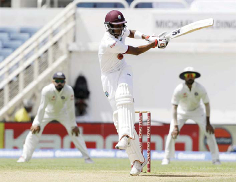 KINGSTON: West Indies’ Roston Chase misses a delivery of India’s Ishant Sharma during day five of their second cricket Test match at the Sabina Park Cricket Ground in Kingston, Jamaica, yesterday. —AP