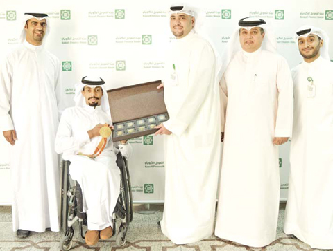 Al-Mutairi receiving the award
