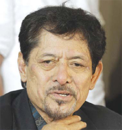 MANILA: Moro National Liberation Front chairman Nur Misuari gestures during a press conference in suburban Taguig, south of Manila. Abu Sayyaf extremists yesterday freed a Norwegian man kidnapped a year ago in the southern Philippines. —AP