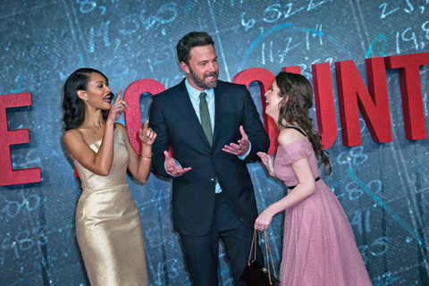 Actors Cynthia Addai-Robinson, from left, Ben Affleck and Anna Kendrick pose for photographers upon arrival at the premiere of the film ‘The Accountant’ in London. — AP