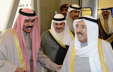KUWAIT: His Highness the Amir Sheikh Sabah Al-Ahmad Al-Jaber Al-Sabah is welcomed by His Highness Crown Prince Sheikh Nawaf Al-Ahmad Al-Jaber Al- Sabah upon his arrival back to Kuwait. — KUNA