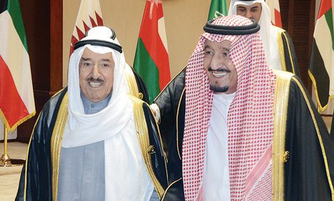 MANAMA: HH the Amir Sheikh Sabah Al-Ahmad Al-Jaber Al-Sabah (left) shares a light moment with Saudi King Salman bin Abdulaziz Al Saud at the GCC summit in the Bahraini capital on Tuesday. — KUNA