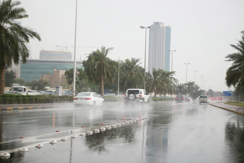 KUWAIT: Rain drenched various areas across Kuwait yesterday with heavy downpours throughout the day. — Photos by Yasser Al-Zayyat