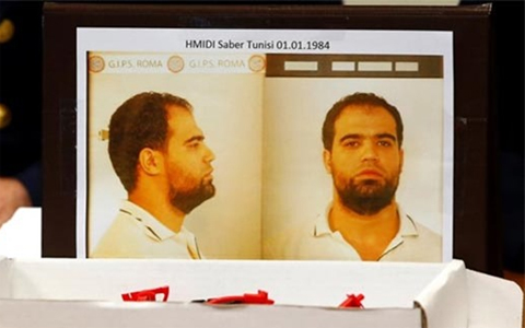 A mugshot of Saber Hmidi is seen at a news conference at the police headquarters in Rome on Tuesday. (AFP)