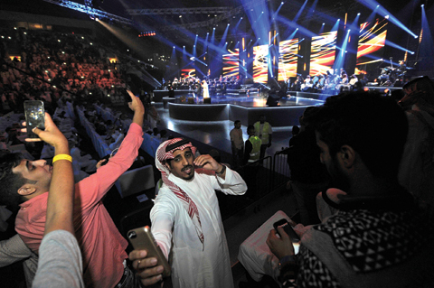 Saudis attend a concert in Jeddah.