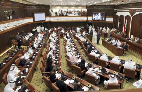 MANAMA: In this file photo, Bahraini lawmakers participate in a special session of parliament to discuss how to handle the uprising in the Gulf island kingdom. — AP
