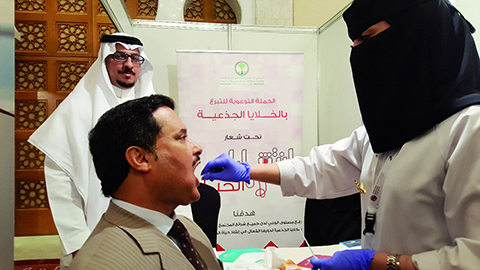KUWAIT: Minister of Health Dr Jamal Al-Harbi undergoes a test during the Sixth ArabnHematology Conference. — KUNA
