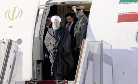 MOSCOW: Iranian President Hassan Rouhani steps off a plane upon his arrival at the government Vnukovo II airport just outside in Moscow, Russia. — AP