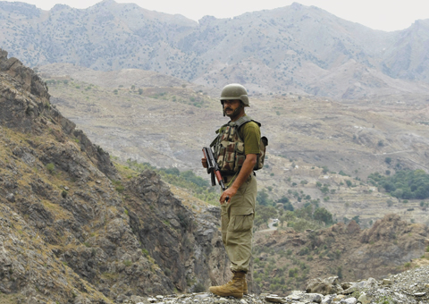 In this June 15, 2016 file photo, a Pakistani army soldier stands guard in Pakistani tribal area of Khyber, near Torkham border post between Pakistan and Afghanistan. —AP