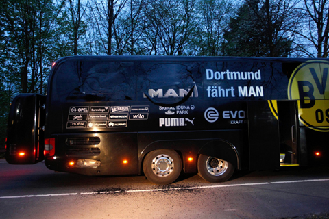 The damaged bus of Borussia Dortmund is pictured after an explosion some 10km away from the stadium prior to the UEFA Champions League 1st leg quarter-final football match BVB Borussia Dortmund v Monaco in Dortmund, western Germany on April 11, 2017. Germany