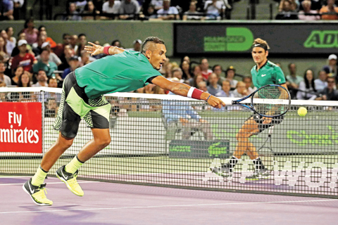   KEY BISCAYNE: Nick Kyrgios of Australia stretches for a shot against Roger Federer of Switzerland in the semi finals at Crandon Park Tennis Center on Friday in Key Biscayne, Florida.   - AFP