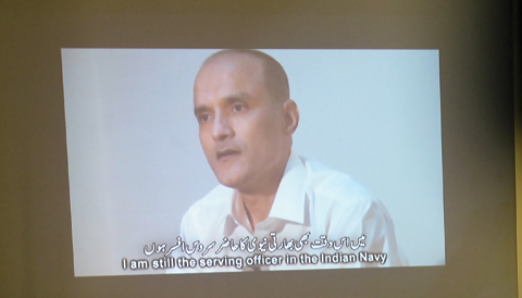 ISLAMABAD: In this photograph taken on March 29, 2016, Pakistani journalists watch a video showing Indian national Kulbhushan Yadav, arrested on suspicion of spying, during a press conference. —AFP