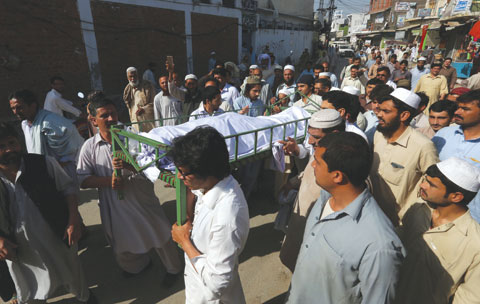 SWABI: Villagers carry a body of a student Mohammad Mashal for burial in Swabi, Pakistan. Police said that a group of students at the Abdul Wali Khan University in the northwestern city of Mardan attacked and killed Mashal, accusing him of sharing blasphemous content on Facebook. — AP