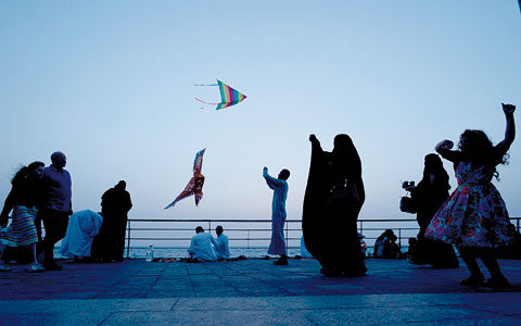 JIDDAH: Children fly kites on the Red Sea beach, in Jiddah, Saudi Arabia. —AFP