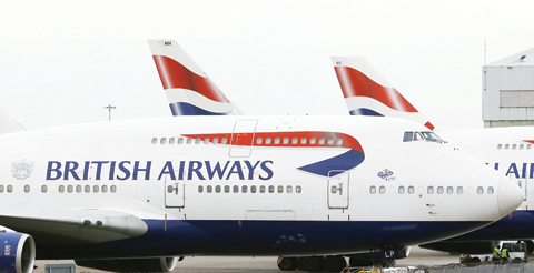 LONDON: British Airways planes are parked at Heathrow Airport in London. Air travelers faced delays yesterday because of a worldwide computer systems failure at British Airways. - AP 
