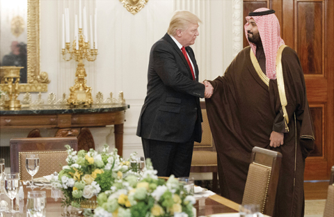 WASHINGTON: In this file photo, US President Donald Trump shakes hands with Saudi Defense Minister and Deputy Crown Prince Mohammed bin Salman, in the State Dining Room of the White House in Washington. — AP