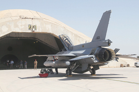 Photo shows one of four new US-made F-16 fighter jets outside a hardened hangar upon its arrival to Balad air base, north of Baghdad, Iraq. —AP