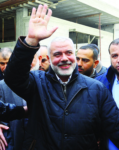 (FILES) This file photo taken on January 27, 2017 shows Hamas leader Ismail Haniya greeting supporters upon his return to Gaza City, after performing the Hajj pilgrimage. Ismail Haniya was elected as the new head of Hamas on May 6, 2017, the Hamas news agency announced. / AFP / MOHAMMED ABED