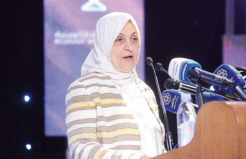 Minister of Social Affairs and Labor Hind Al-Sabeeh speaks during the event