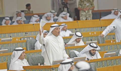 KUWAIT MP Shuaib Al-Muwaizri speaks during yesterday’s session.— Photos by Yasser Al-Zayyat