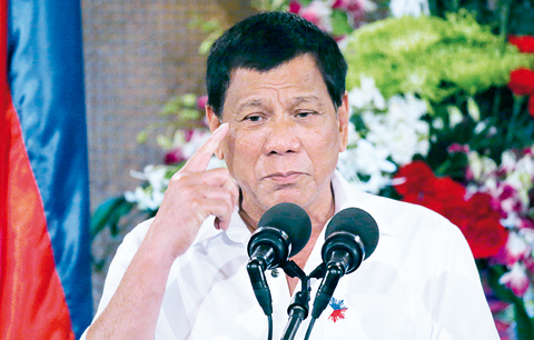MANILA: In this file photo, Philippine President Rodrigo Duterte gestures while addressing Filipino Muslim leaders during a reception at the Presidential Palace in Manila, Philippines.—AP