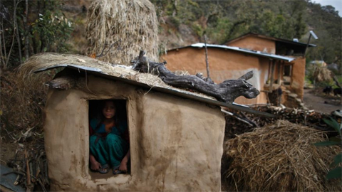 File Photo of Uttara Saud, 14, sits inside a Chaupadi shed in the hills of Legudsen village in Achham District in western Nepal February 16, 2014  (REUTERS)