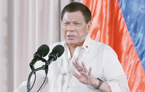 MANILA: Philippine President Rodrigo Duterte gestures during the 19th Founding Anniversary of the Volunteers Against Crime and Corruption at the Malacanang Presidential Palace in Manila on Wednesday. —AP