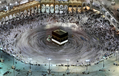 MAKKAH: This long exposure photograph shows pilgrims circumambulating the Kaaba, Islam's holiest shrine, in the Grand Mosque on Sunday prior to the start of the annual hajj pilgrimage. - AFP 