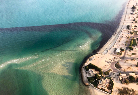 Photos released by the Environment Public Authority show an oil spill near southern Ras Al-Zour in Arabian Gulf waters. — AP