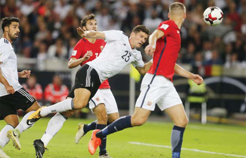 STUTTGART: Germany’s Mario Gomez scores his side’s sixth goal during the World Cup Group C qualifying soccer match between Germany and Norway in Stuttgart, Germany, Monday. — AP