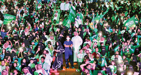 RIYADH: In this Sept 23, 2017 file photo released by Saudi Press Agency, SPA, Saudi men and women attend national day ceremonies at the King Fahd stadium in Riyadh. — AP