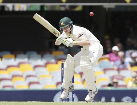 BRISBANE: Australia’s Cameron Bancroft ducks under a bouncer during an Ashes cricket Test between England and Australia in Brisbane, Australia, yesterday.— AP
