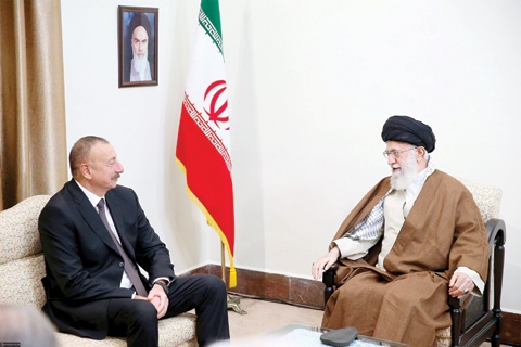 nnTEHRAN: A handout picture provided by the office of Iran's Supreme Leader Ayatollah Ali Khamenei shows him (right) meeting with Azerbaijan's President Ilham Aliyev in Tehran. _ AFP n