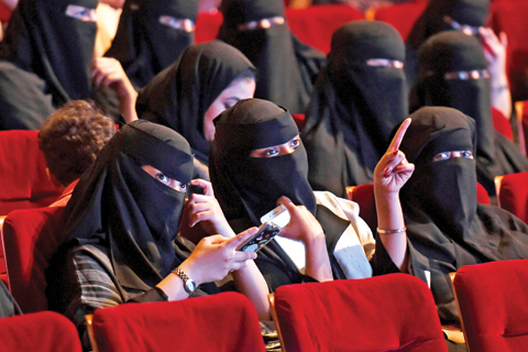 RIYADH: This Oct 20, 2017 photo shows Saudi women attending a film festival at King Fahd Culture Center. – AFP 