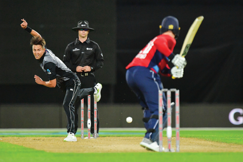 WELLINGTON: New Zealand’s Trent Boult (L) bowls to England’s Jason Roy (R) during the first Twenty20 cricket match between New Zealand and England at Westpac Stadium in Wellington yesterday. —AFP