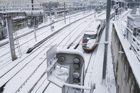 PARIS: A picture taken yesterday in Paris shows snow covered railways. _ AFP 