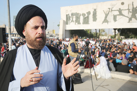 BAGHDAD: Ibrahim Al-Jabiri, one of the leaders of Iraq’s Shiite Sadr Movement, gives an interview during a demonstration by the movement in the capital Baghdad’s Tahrir square against corruption in the Iraqi government. —AFP