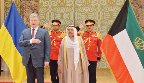 His Highness the Amir Sheikh Sabah Al-Ahmad Al-Jaber Al-Sabah welcomes Ukraine's President Petro Poroshenko to Kuwait.