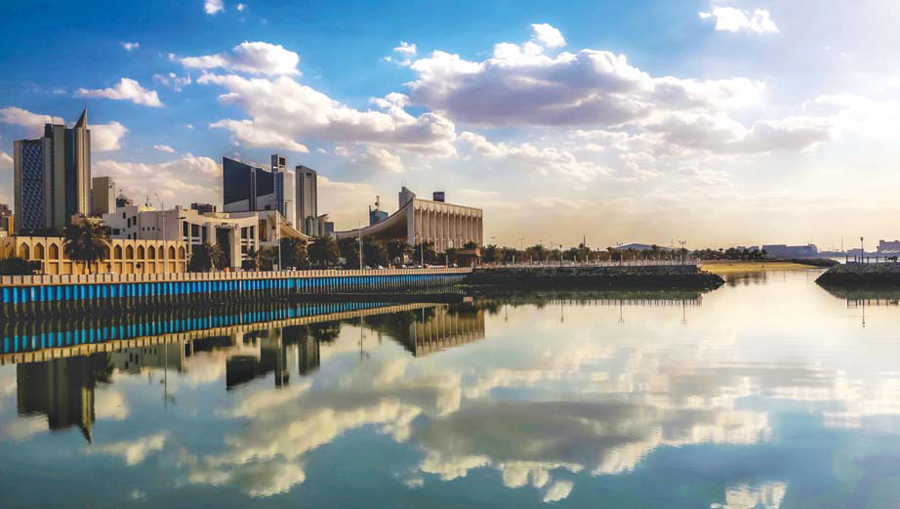 KUWAIT: Reflection of clouds and the National Assembly's building on the Arabian Gulf's waters near Shuwaikh Beach. - KUNA photo